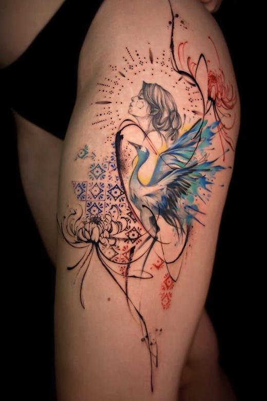 Watercolour and fine line thigh tattoo
